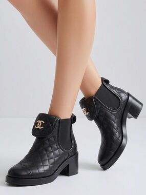 Chanel black Lambskin Quilted Cap Toe CC Turnlock Booties
